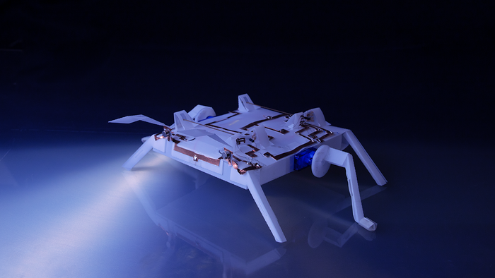 Origami-Inspired Robots can Sense, Analyze and act in Challenging Environments